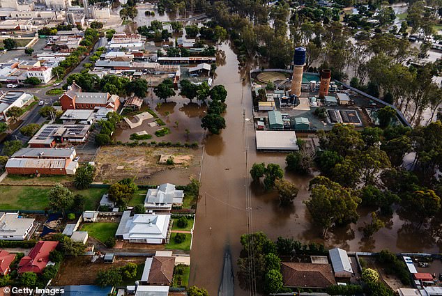 Residents of Seymour, Yea and Rochester trapped by flooding (pictured, Rochester on Tuesday)