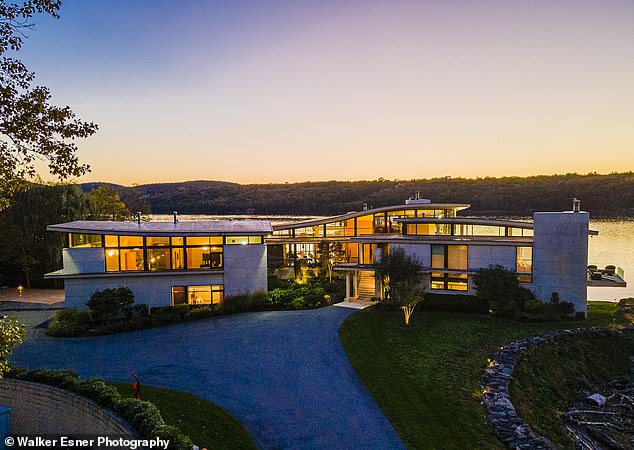 The house is built around a steel structure covered with 45,000 square meters of fossilized limestone