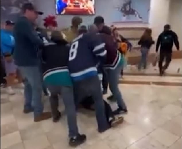 Moments earlier, a fight broke out publicly between a bunch of Jets fans and Ducks fans