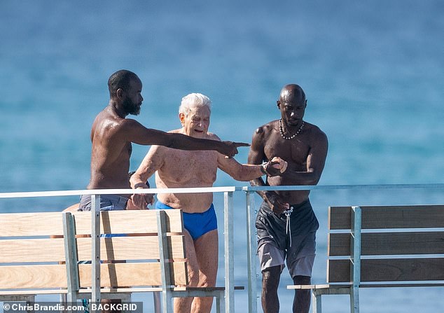 1704791076 538 George Soros 93 is helped into the sea for a