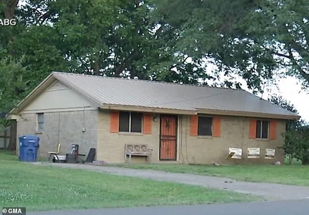 Aderrien Murry was woken at around 4am on May 20 by the sound of his mother's ex-boyfriend behaving threateningly outside the house (pictured), so he was asked to call the police