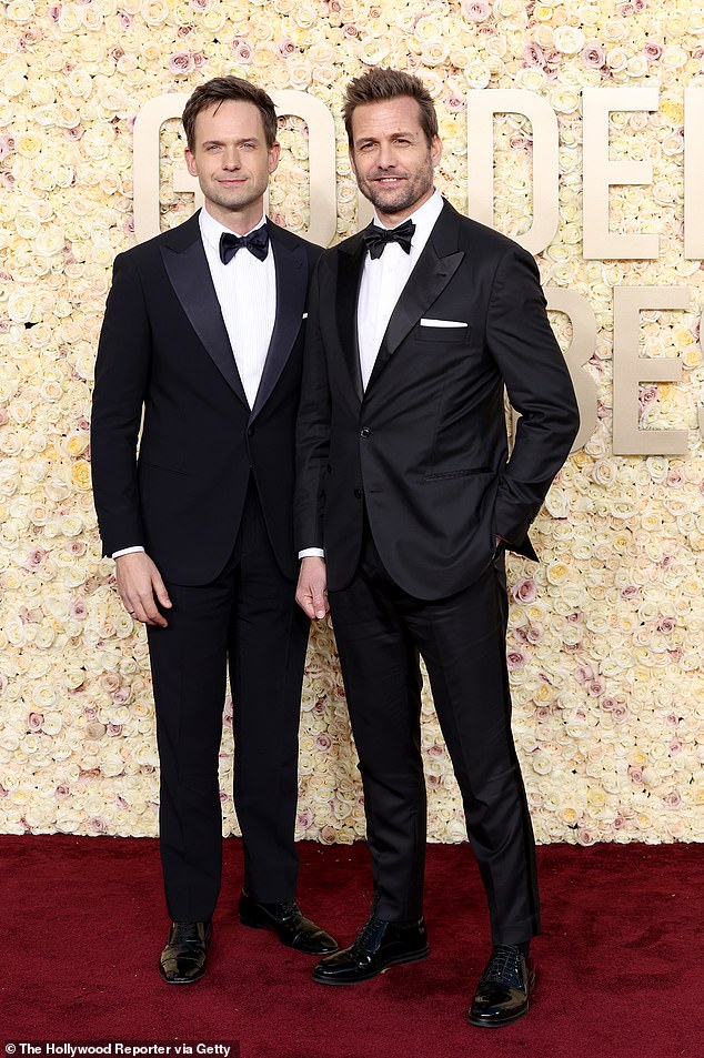 Adams and Macht happily posed together on the red carpet, both looking sharp in stylish black tuxedos