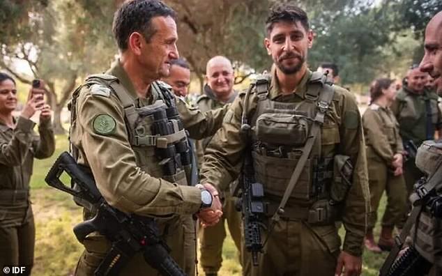 Ynet said Amedi, who the report said has been in reserve since Hamas launched its attack on southern Israel on October 7, was injured on Monday (photo: Amedi, right, with IDF Chief of Staff Herzi Halevi, left)