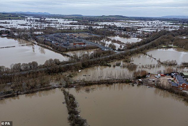 Fields on the outskirts of Gloucester were flooded yesterday as days of stormy weather and heavy rain took their toll across the country