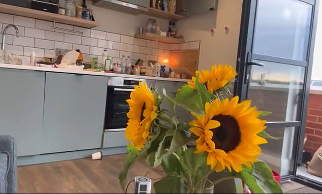 She said she was happy to be home in London and showed fans sunflowers from a friend