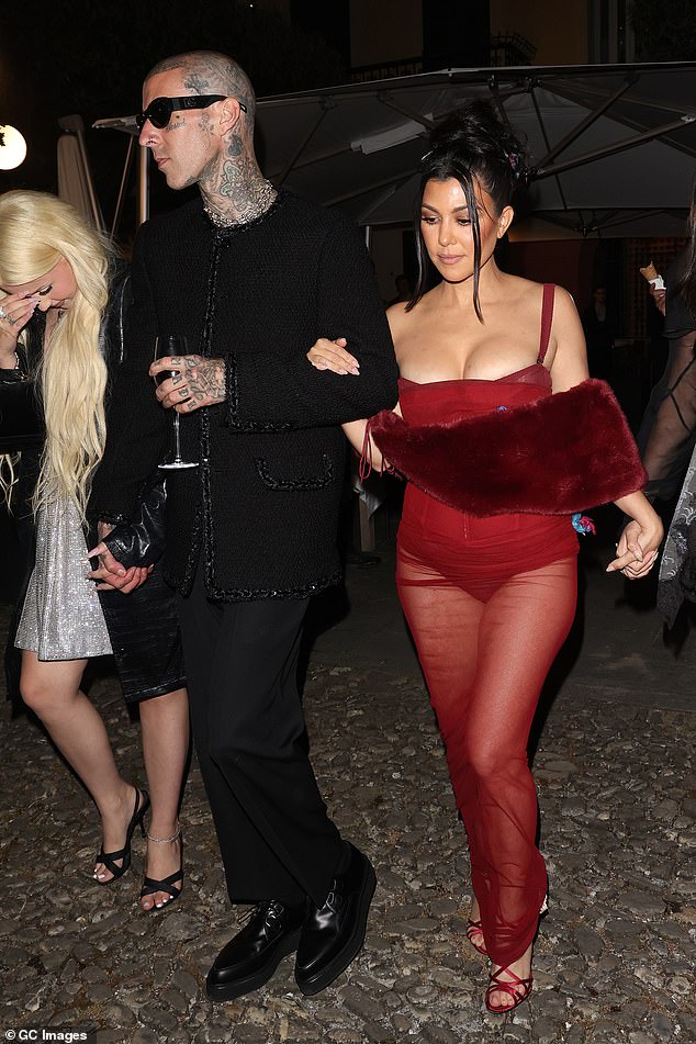 Barker holds hands with daughter Alabama while pictured with new wife Kourtney Kardashian in Portofino, Italy in 2022