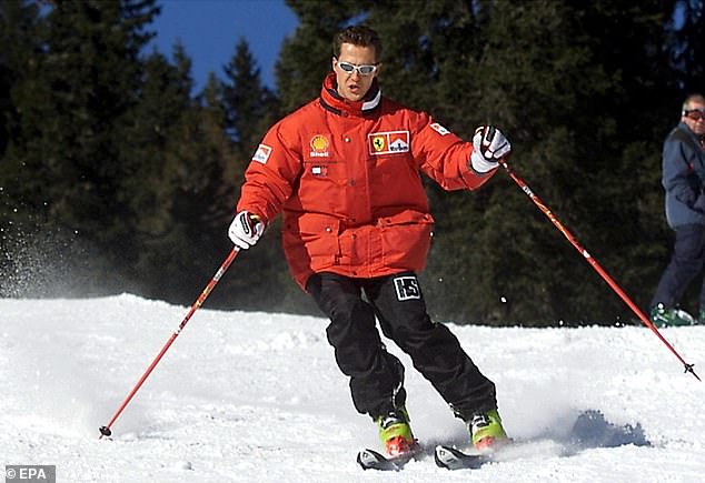 A file photo dated January 11, 2000 shows German Formula 1 Ferrari driver Schumacher making a turn while skiing in the Italian resort of Madonna di Campiglio, Italy