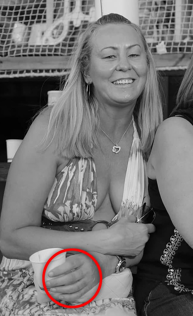 Gill Catchpole was pictured without her wedding ring (circled) in August last year.