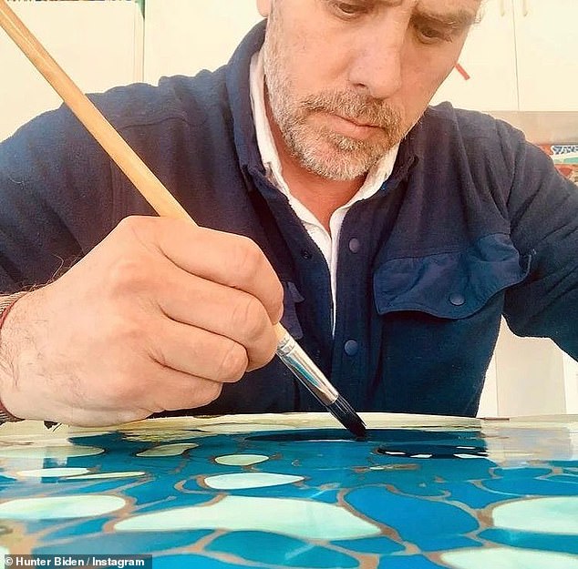 Hunter Biden hard at work on one of his many paintings.  His manager said he could be one of the most important artists of the century