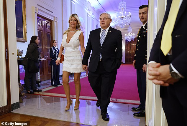 Bob Menendez and his wife Nadine arrive for a reception in the East Room of the White House on May 16, 2022