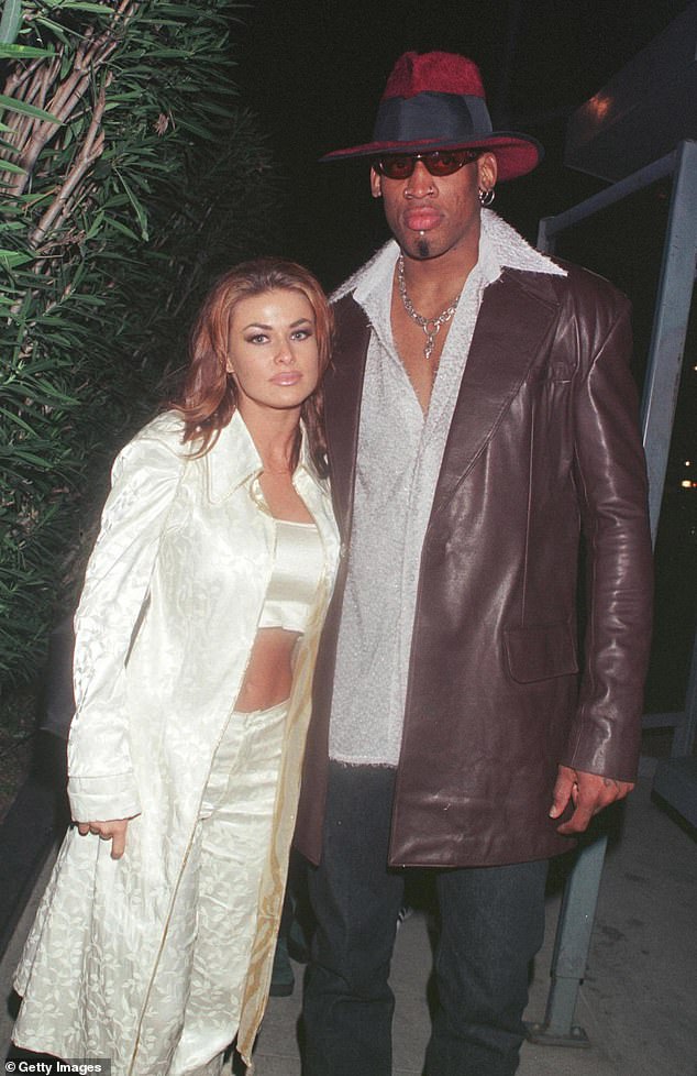 Before that, she married NBA star Dennis Rodman in 1998, before divorcing the following year in 1999;  They can be seen in Beverly Hills in 1999