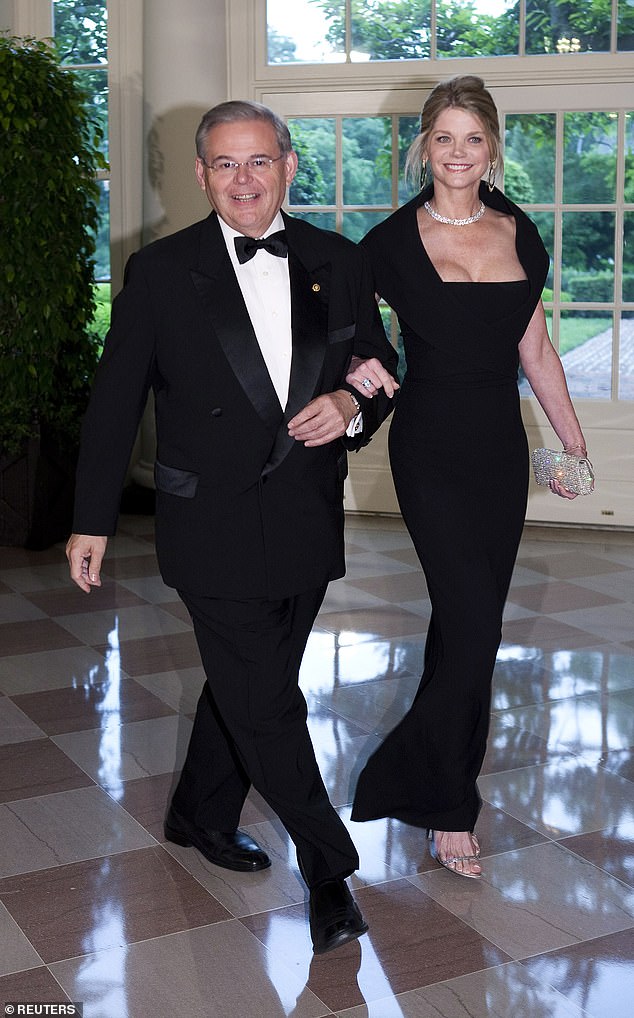 Beck is seen at the White House with Senator Bob Menendez of New Jersey, during a dinner honoring Mexican President Felipe Calderon