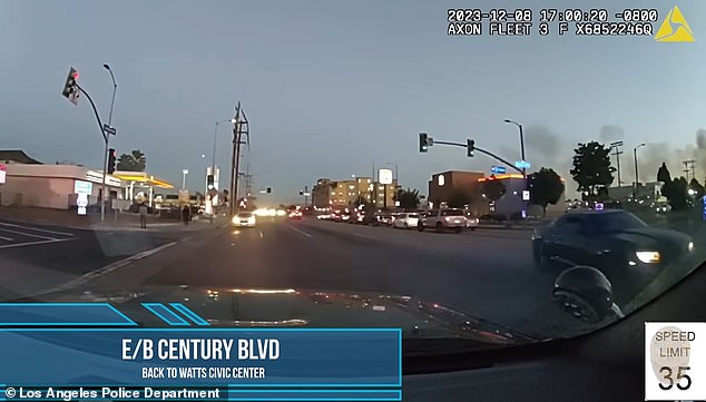 The video released by LAPD begins with the unnamed officer driving east on Century Boulevard with flash and siren activated