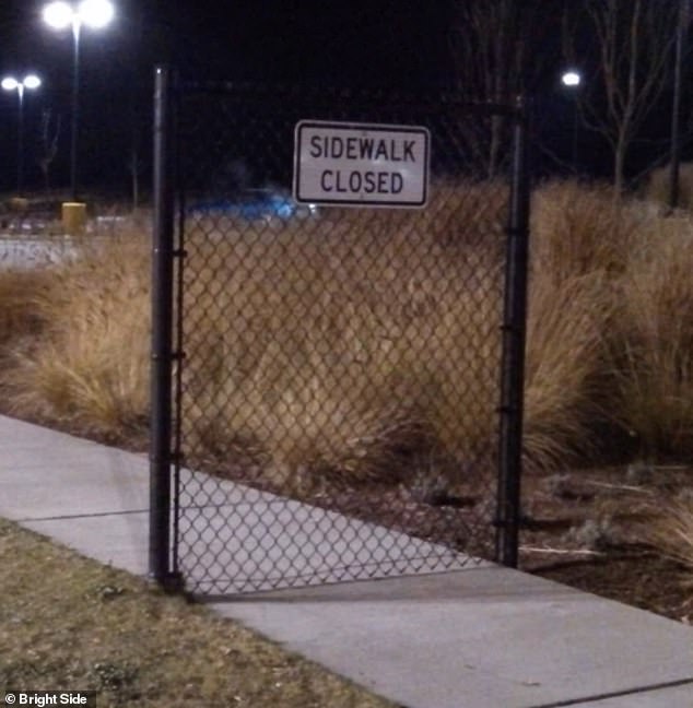 What's the point of that?  A fence has been installed to close off the sidewalk in the US, but people can easily walk around it