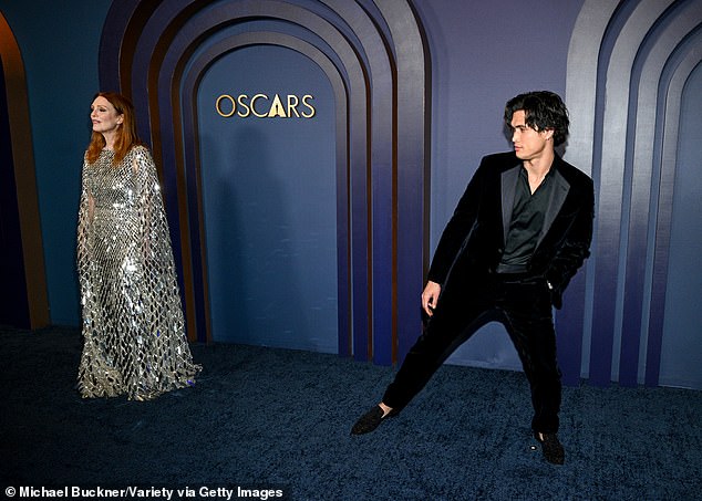 Charles' hair was styled by groomer Candice Birns and he looked dapper in a black velvet suit by Giorgio Armani and loafers selected by stylist Samantha McMillen.