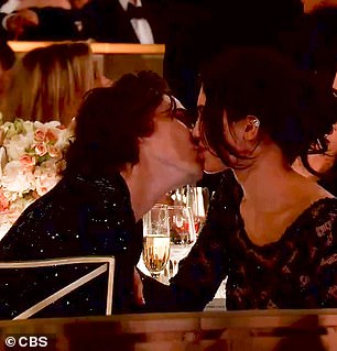 They then enjoyed a sweet kiss for the cameras