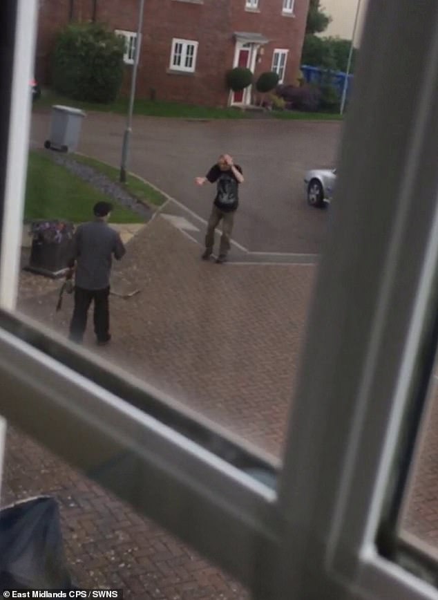 Mobile phone footage taken by another resident shows Mr Benton holding his head