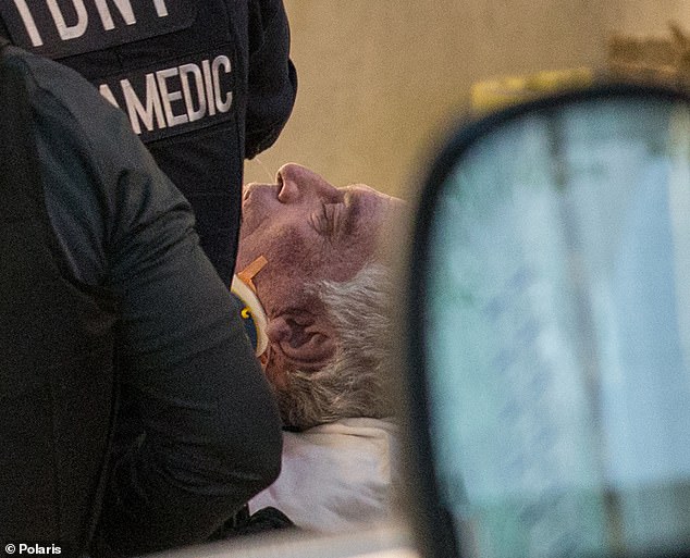 Epstein's body is pictured being moved from the Manhattan Correctional Center to a New York hospital, where he was pronounced dead of an apparent suicide