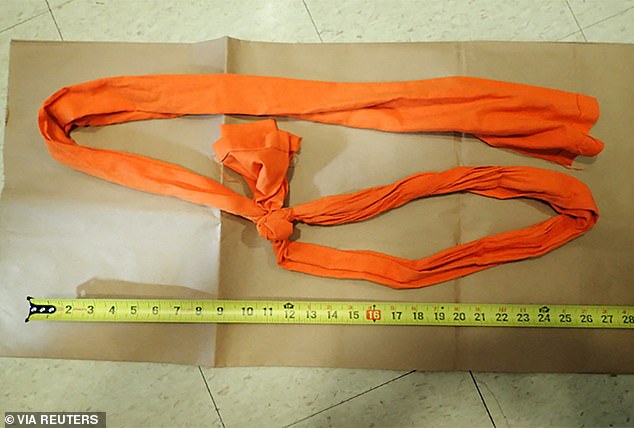 The piece of cloth Epstein allegedly used as a noose was not torn or cut when presented into evidence.  A prison guard said he tore and cut off Epstein's material when he was found