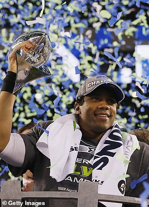 Russell Wilson celebrates the Super Bowl in February 2014