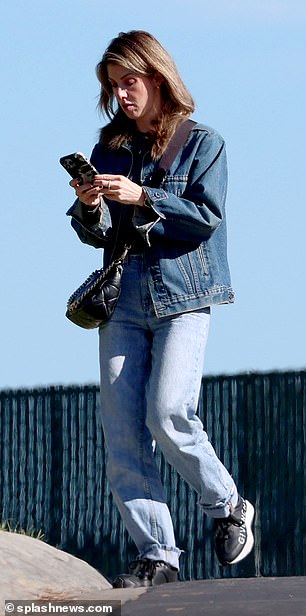 Kelly looked pensive as she left the ceremony after paying her respects on the second anniversary of her husband's death