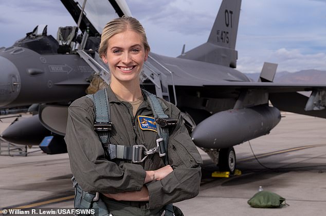 Marsh, pictured last month ahead of her introductory flight at Nellis Air Force Base, enjoys talking to other young girls about being a pilot and serving in the military and sees it as an opportunity to dispel stereotypes about military women.