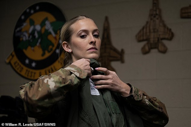 U.S. Air Force 2nd Lt. Madison Marsh tailors a flight suit in preparation for a familiarization flight at Nellis Air Force Base, Nevada on December 18, 2023