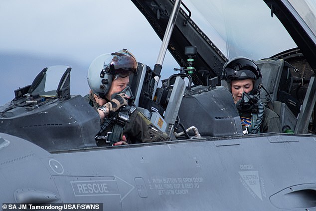 US Air Force 2nd Lt.  Madison Marsh (right) prepares for her familiarization flight at Nellis Air Force Base, Nevada on December 19, 2023