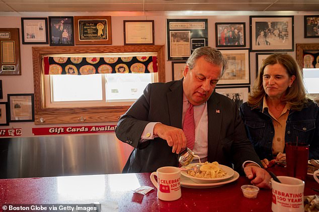 The former governor of New Jersey will end his campaign before Iowa becomes the first state to vote on Monday, according to Bloomberg and journalist Mark Halperin.  He is pictured with his wife Mary campaigning in New Hampshire