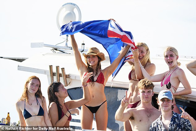 The photo shows a group of young Aussies celebrating Australia Day on the Gold Coast