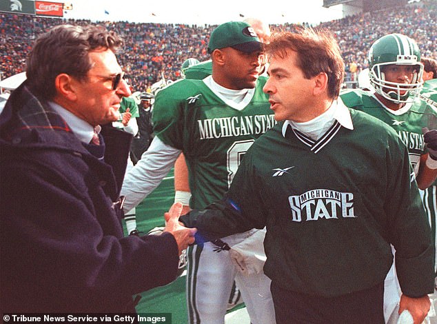 Saban, then the head coach of Michigan State, shakes hands with Penn State's Joe Paterno