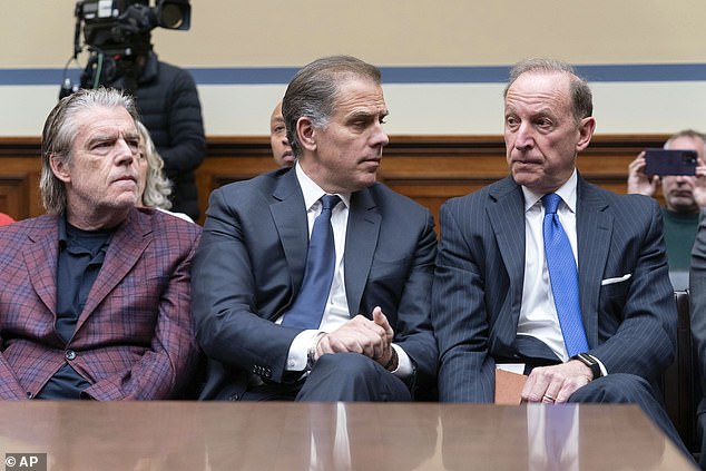 Hunter Biden sits between his attorney Abbe Lowell, right, and Kevin Morris, left