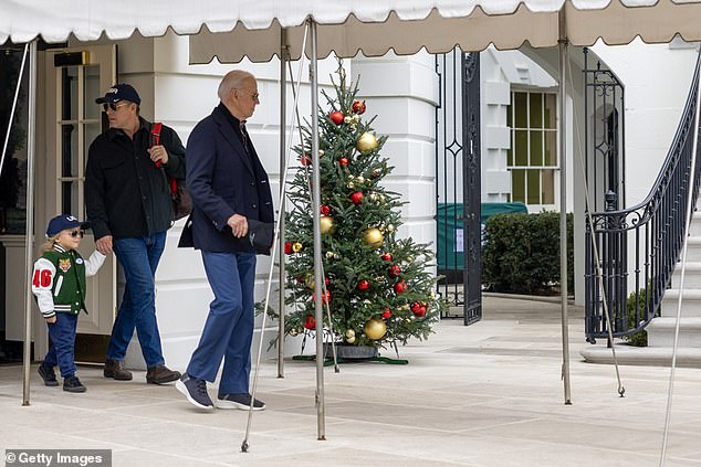 President Joe Biden walks out of the White House with Hunter Biden and his son Beau Biden in December, ahead of the family's Christmas at Camp David