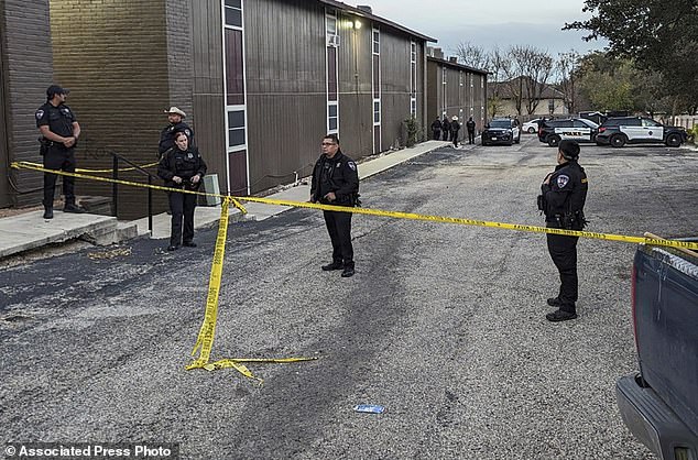 Police cordon off the spot where two bodies were discovered