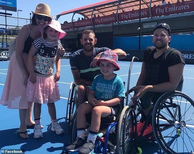 The youngster (pictured center with seven-time Australian Open champion Dylan Alcott, right) loves tennis and wants to inspire other children in wheelchairs