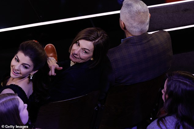 Florida First Lady Casey DeSantis sits in the front row during Wednesday's debate, next to Iowa Governor Kim Reynolds