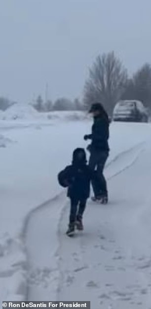 In a video, he can be seen chasing mother Casey DeSantis and throwing the snowball at her