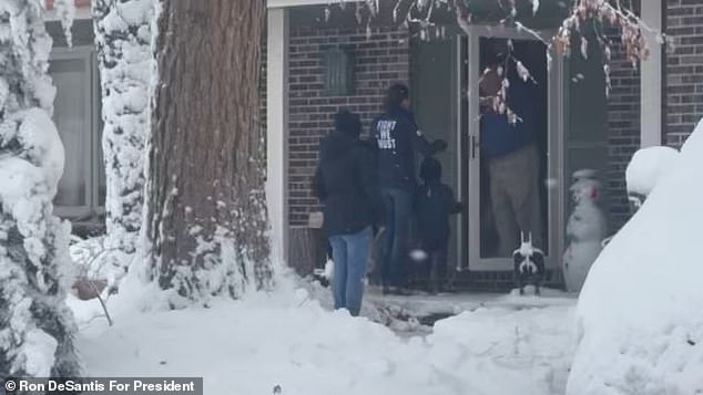 Pictured: The mother-son duo knocked on a campaign milestone marking 3 million doors in Iowa