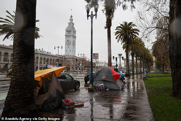 Homeless tents are seen along Embarcadero Street during heavy rains in San Francisco earlier this year