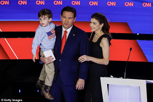 Republican 2024 Ron DeSantis with his wife Casey and son Mason after Wednesday night's CNN debate against Nikki Haley in Des Moines, Iowa