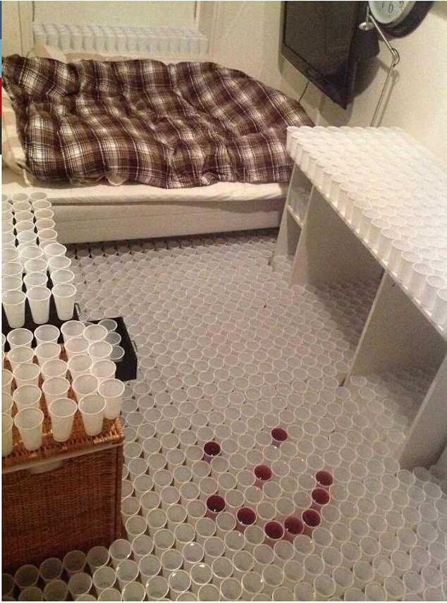 The person who owns this room was certainly not amused when he came home to find plastic cups covering EVERY surface