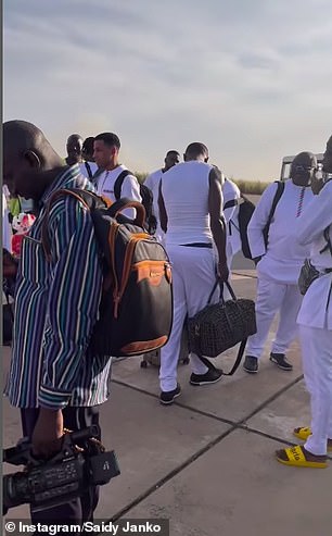 The team was seen back at Banjul airport waiting for a new flight