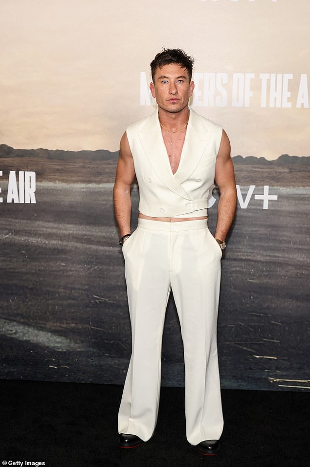 The actor wore a watch and bracelet, while he completed his look with matching white wide-leg trousers and black dress shoes