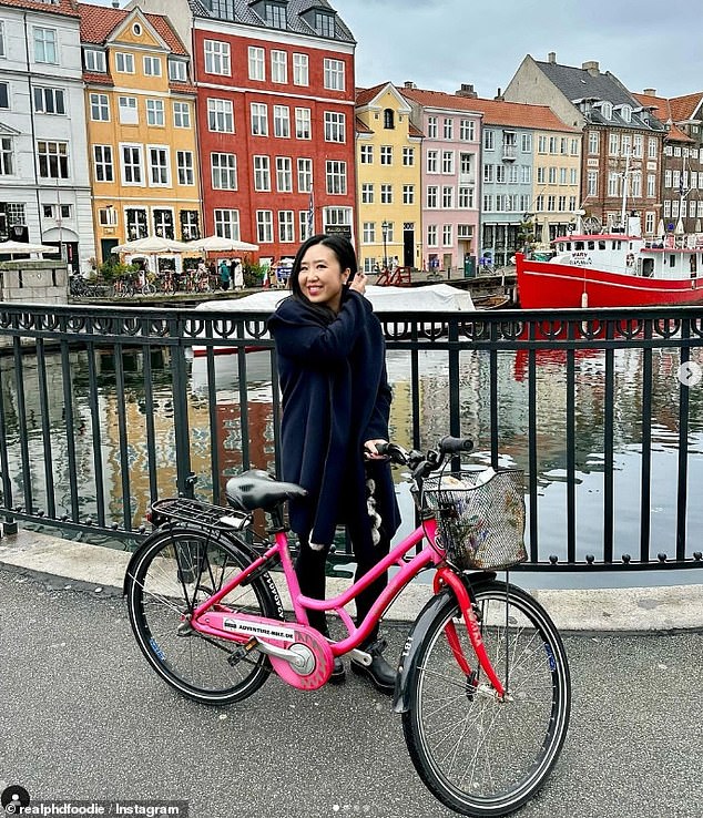 Angela, pictured in Copenhagen, travels Europe alone, visiting eight cities in four countries – and said France felt 'cold' compared to other, more 'friendly' countries