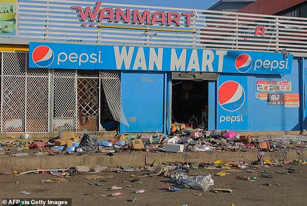 A damaged shop is pictured amid a state of unrest in Port Moresby, the capital of Papua New Guinea