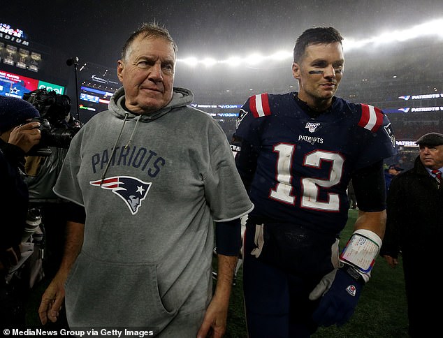 Belichick smiles next to Tom Brady after beating the Browns for his 100th win in 2019