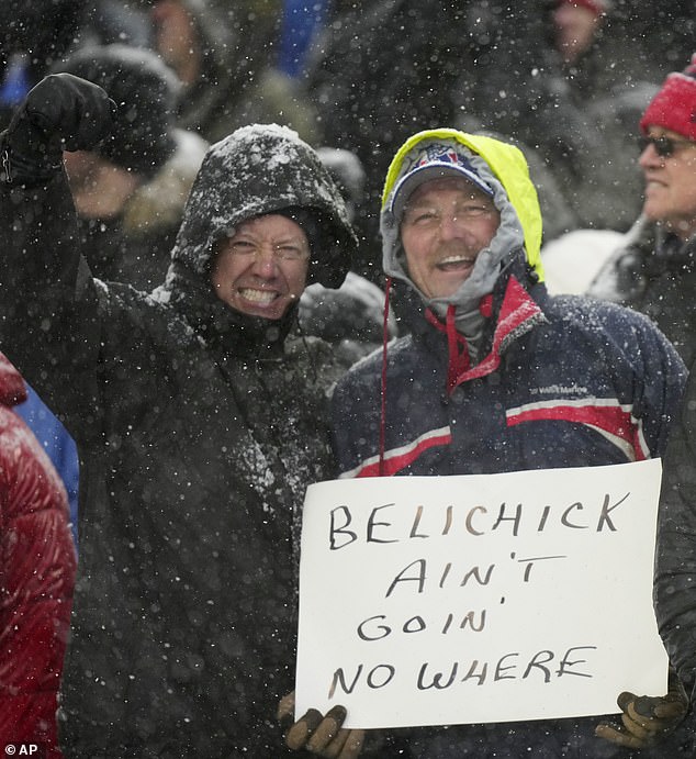 Patriots fans show their support for Belichick during the final game of the season against the Jets on Sunday