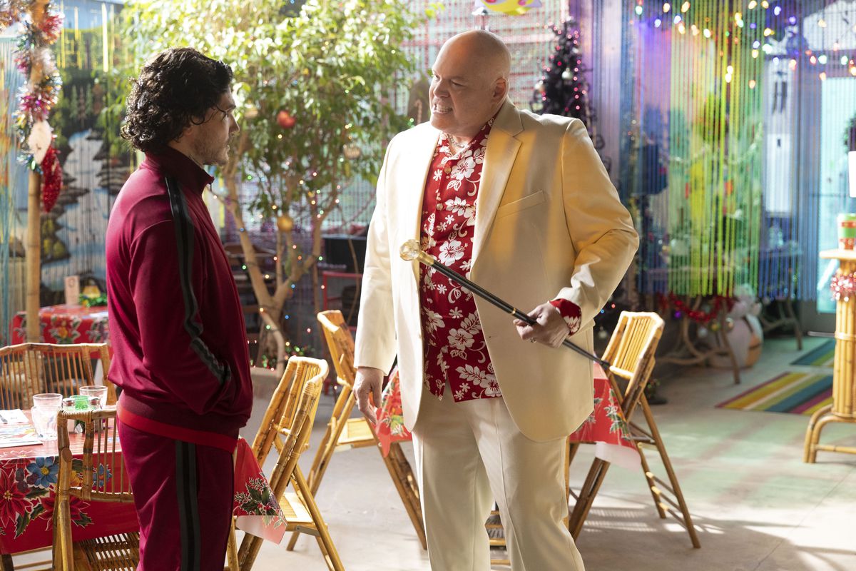 Wilson Fisk (Vincent D'Onofrio) threatens one of his henchmen while wearing a white suit with a Hawaiian print shirt underneath