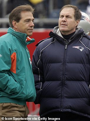 Then-Dolphins coach Nick Saban talks to Bill Belichick in 2006