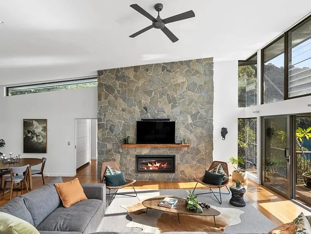 Located overlooking the river at Collingride Point, a 15-minute boat ride from Berowra Waters, the house features a spacious and practical open-plan design